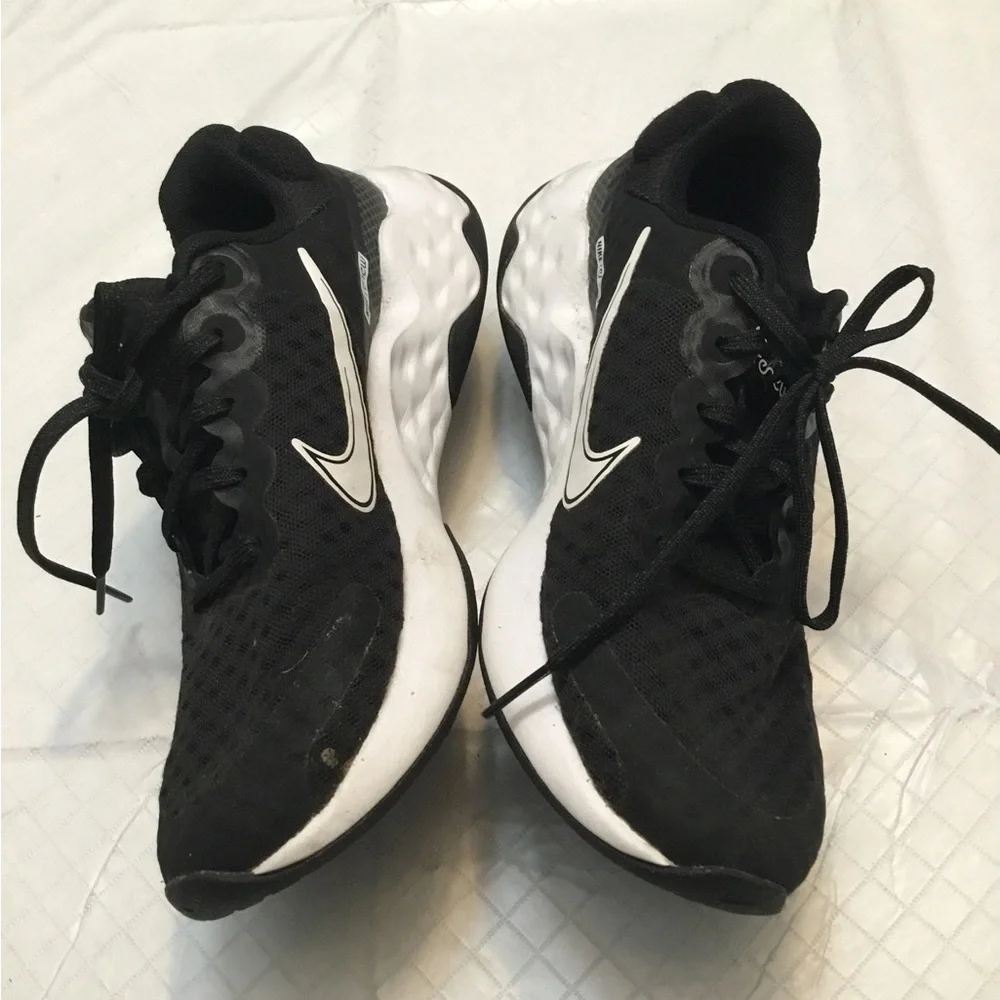 Nike Black Sneakers with White Swoosh
